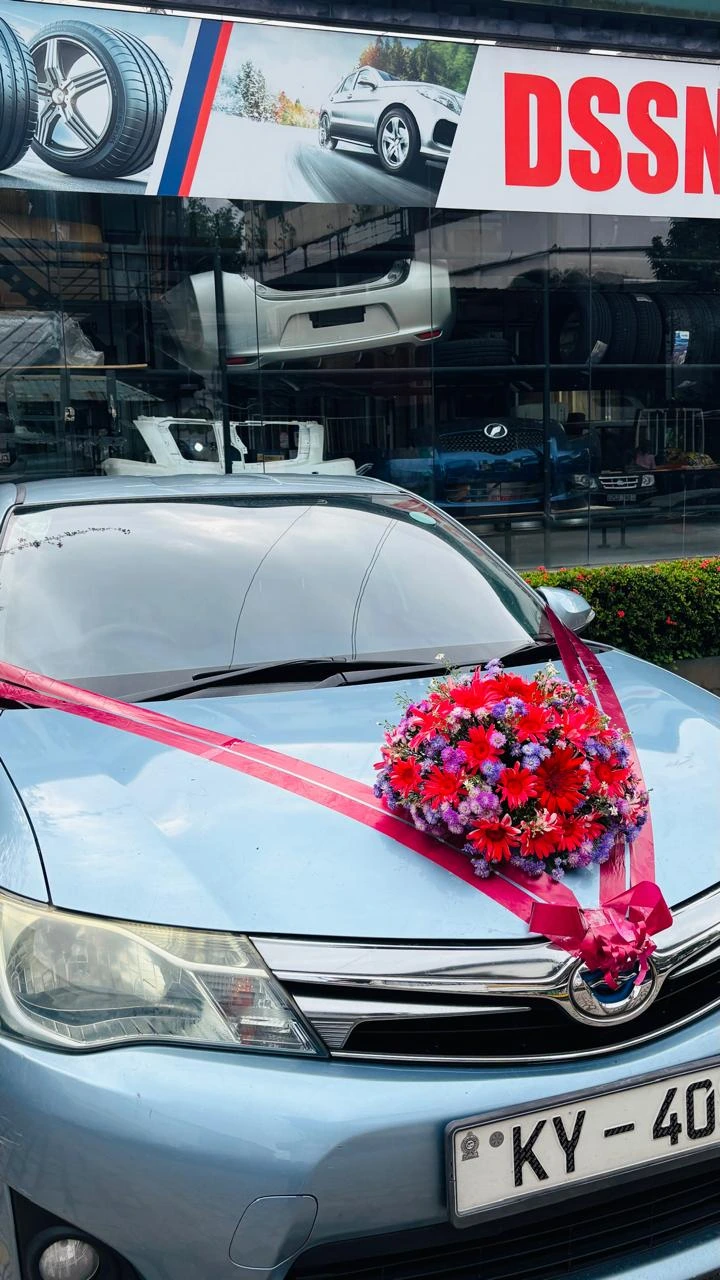 Portrait of a flower-decorated bridal car